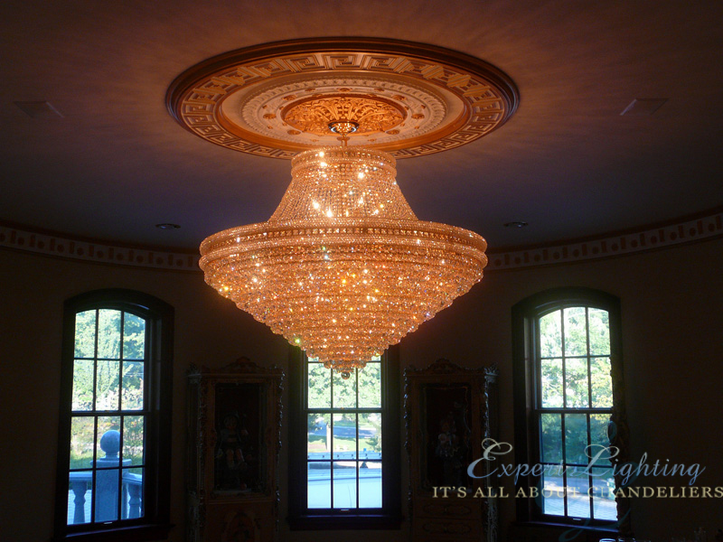 Installation of chandelier Colonia NJ Expert Lighting Inc.